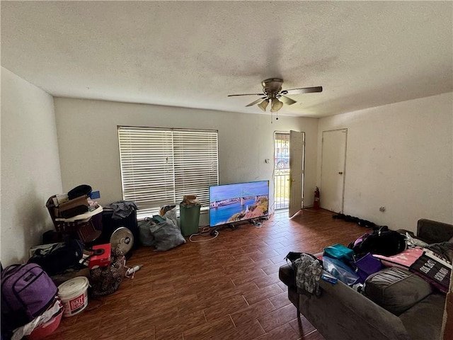 149 Becky Dr, Avondale, LA 70094 - unfurnished living room featuring ceiling fan, a textured ceiling, and wood finished floors