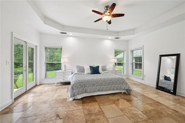 47261 Eldridge Magee Rd, Franklinton, LA 70438 - bedroom with access to outside, stone tile floors, and baseboards
