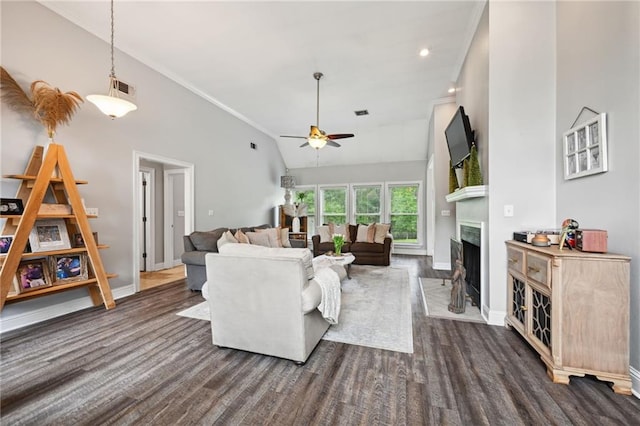47261 Eldridge Magee Rd, Franklinton, LA 70438 - living room featuring ceiling fan, a fireplace, dark wood-type flooring, baseboards, and lofted ceiling