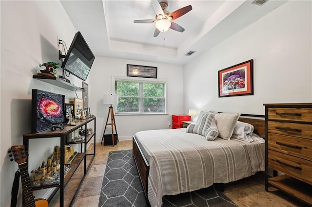 47261 Eldridge Magee Rd, Franklinton, LA 70438 - bedroom featuring a raised ceiling and baseboards