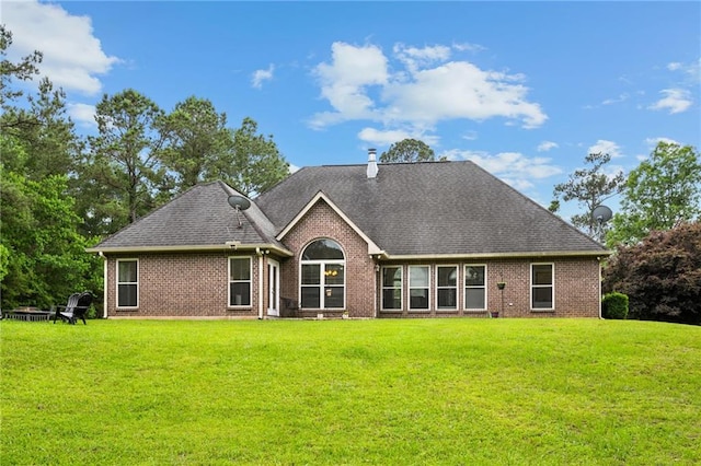 47261 Eldridge Magee Rd, Franklinton, LA 70438 - back of house featuring brick siding, a yard, and a shingled roof