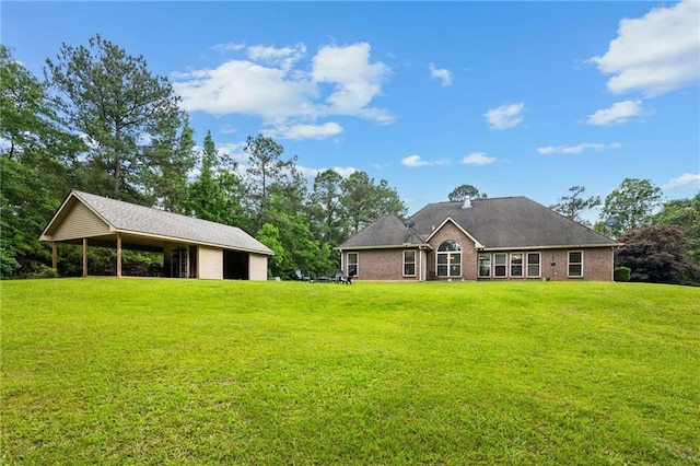47261 Eldridge Magee Rd, Franklinton, LA 70438 - rear view of house featuring a lawn and brick siding