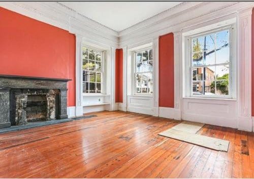 908-10 Esplanade Ave, New Orleans, LA 70116 - foyer entrance with hardwood / wood-style floors and a fireplace