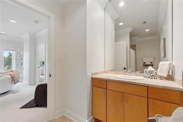 109 Northline St, Metairie, LA 70005 - ensuite bathroom featuring ornamental molding, vanity, recessed lighting, and baseboards