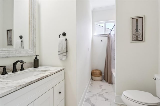 5317 Warrington Dr, New Orleans, LA 70122 - full bath featuring marble look tile flooring, toilet, vanity, baseboards, and shower / bath combo with shower curtain