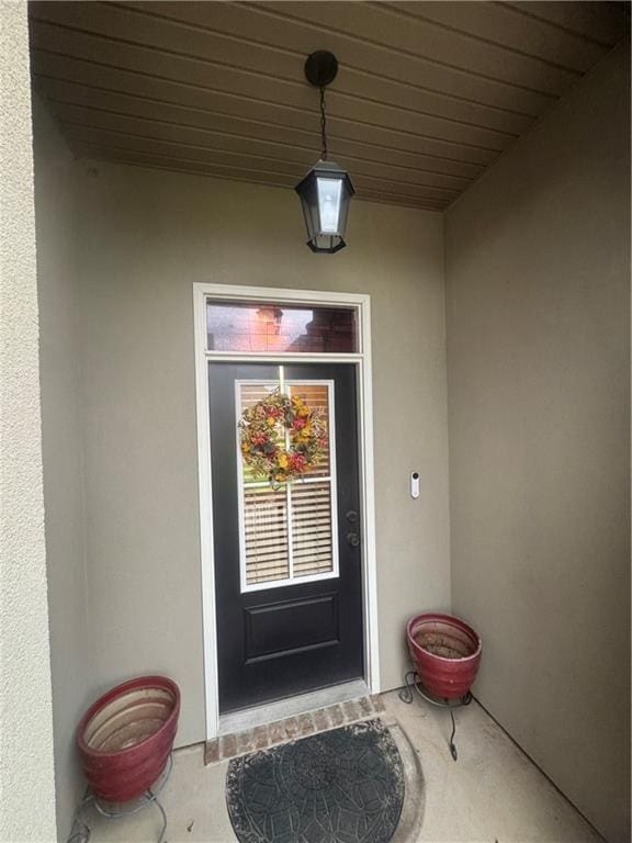 11018 Regency Ave, Hammond, LA 70403 - doorway to property with stucco siding
