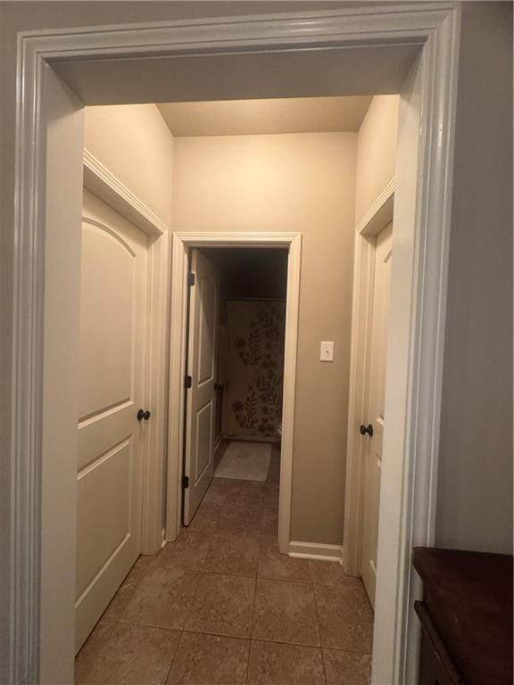 11018 Regency Ave, Hammond, LA 70403 - hallway featuring light tile patterned floors