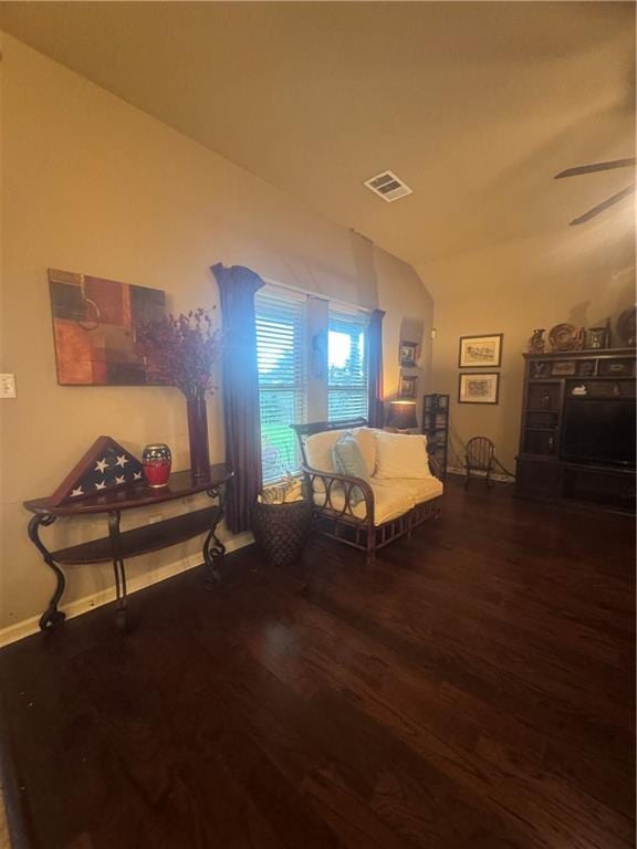 11018 Regency Ave, Hammond, LA 70403 - living area featuring wood finished floors, lofted ceiling, a ceiling fan, and baseboards