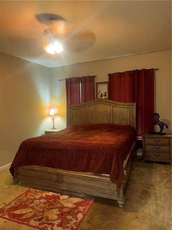 11018 Regency Ave, Hammond, LA 70403 - bedroom featuring carpet floors, a ceiling fan, and baseboards