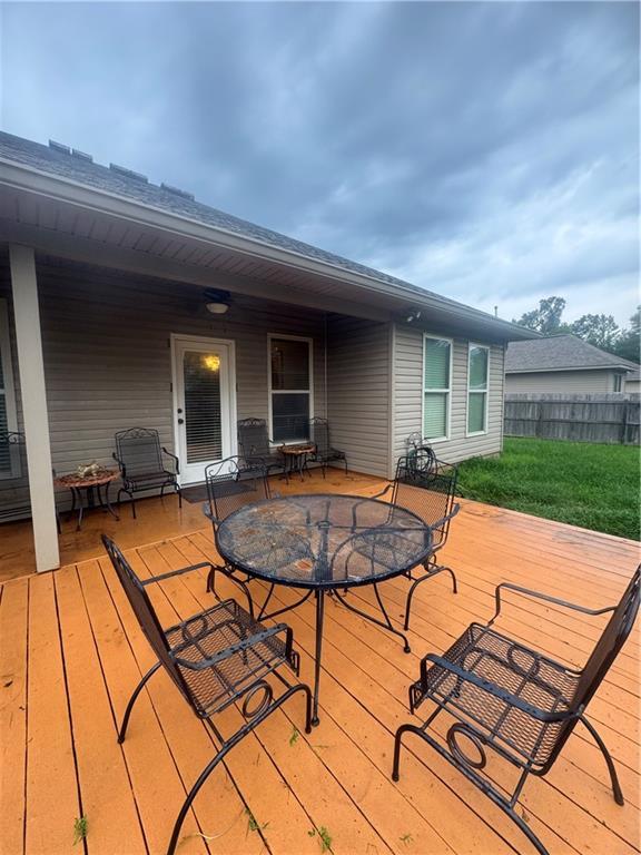 11018 Regency Ave, Hammond, LA 70403 - wooden terrace with outdoor dining area