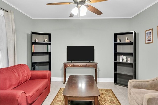 4101 Hessmer Ave Unit 109, Metairie, LA 70002 - living room featuring crown molding, a ceiling fan, light tile patterned floors, and baseboards