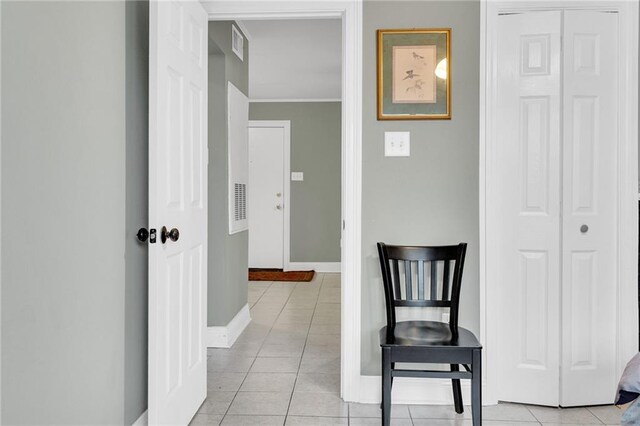 4101 Hessmer Ave Unit 109, Metairie, LA 70002 - corridor featuring light tile patterned floors and baseboards