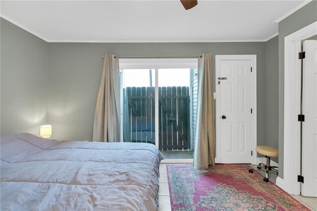 4101 Hessmer Ave Unit 109, Metairie, LA 70002 - bedroom with crown molding, carpet floors, baseboards, and a ceiling fan