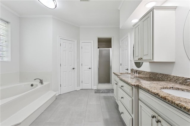 126 Rue Acadian, Belle Chasse, LA 70037 - full bath with a stall shower, a garden tub, crown molding, double vanity, and tile patterned floors