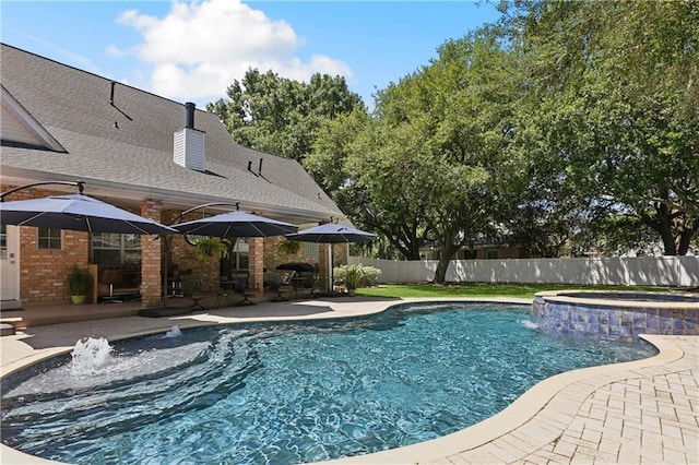 126 Rue Acadian, Belle Chasse, LA 70037 - view of pool featuring a patio and a pool with connected hot tub