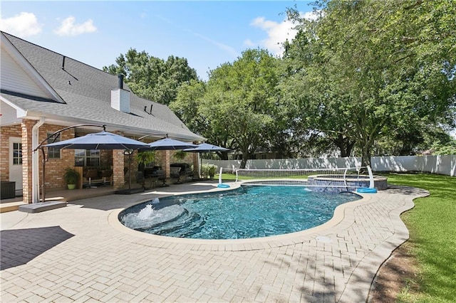 126 Rue Acadian, Belle Chasse, LA 70037 - view of swimming pool with a patio area and a pool with connected hot tub