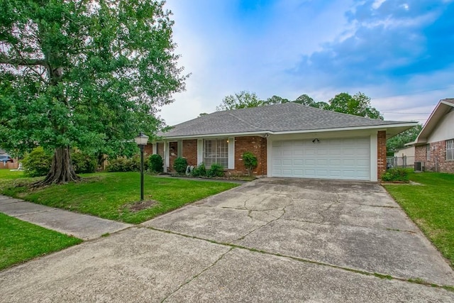 1414 Englewood Dr, Slidell, LA 70458 - ranch-style home featuring brick siding, a garage, concrete driveway, and a shingled roof