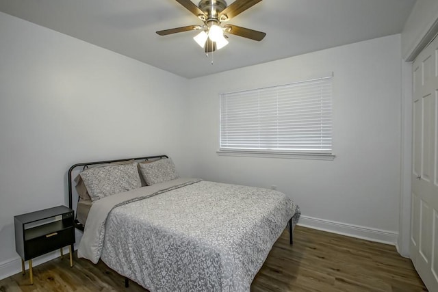 1414 Englewood Dr, Slidell, LA 70458 - bedroom featuring baseboards, wood finished floors, ceiling fan, and a closet