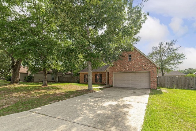 413 Oakley Blvd, Pearl River, LA 70452 - view of front of home with concrete driveway, a garage, and brick siding