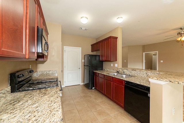 413 Oakley Blvd, Pearl River, LA 70452 - kitchen with black appliances, a sink, reddish brown cabinets, a peninsula, and a ceiling fan