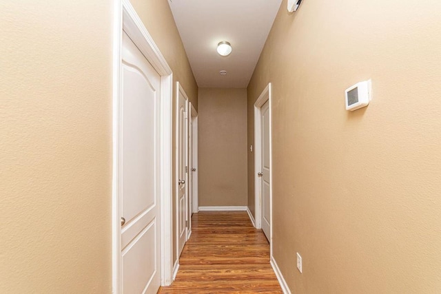 413 Oakley Blvd, Pearl River, LA 70452 - hallway featuring wood finished floors and baseboards