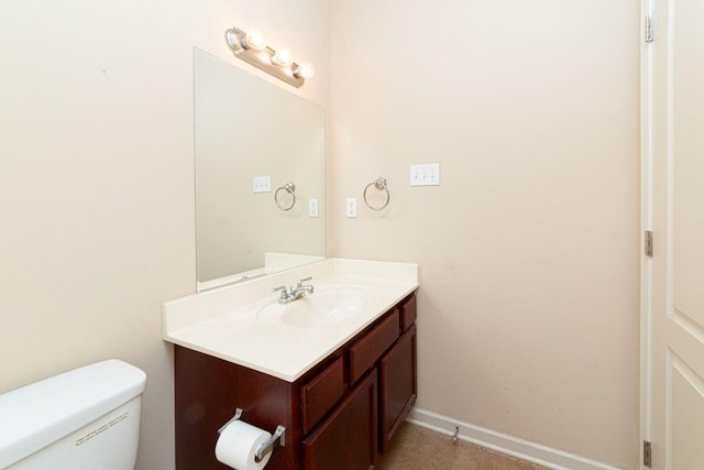 413 Oakley Blvd, Pearl River, LA 70452 - bathroom with vanity, toilet, and baseboards
