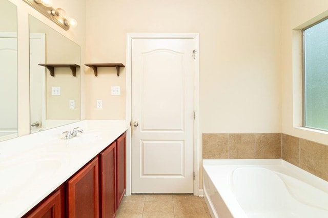 413 Oakley Blvd, Pearl River, LA 70452 - bathroom with double vanity, a garden tub, and tile patterned floors
