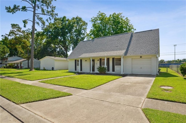 1017 Ridgefield Dr, La Place, LA 70068 - view of front of home featuring an attached garage, driveway, covered porch, roof with shingles, and brick siding