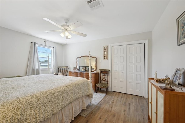 1017 Ridgefield Dr, La Place, LA 70068 - bedroom with a closet, wood finished floors, and ceiling fan