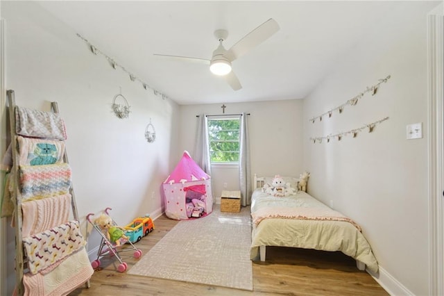 1017 Ridgefield Dr, La Place, LA 70068 - bedroom with wood finished floors, baseboards, and ceiling fan