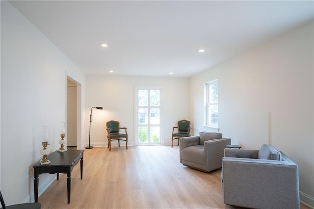 408 22 Nd St Unit 408, New Orleans, LA 70124 - sitting room featuring light wood finished floors, recessed lighting, and baseboards