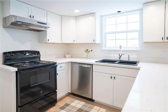 408 22 Nd St Unit 408, New Orleans, LA 70124 - kitchen featuring black range with electric cooktop, dishwasher, under cabinet range hood, a sink, and white cabinetry