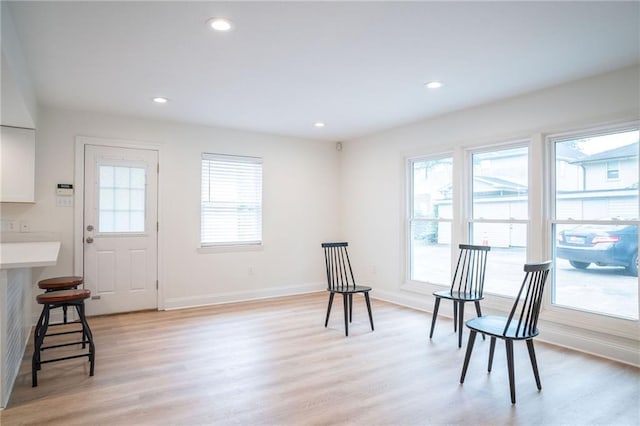 408 22 Nd St Unit 408, New Orleans, LA 70124 - sitting room featuring healthy amount of natural light, light wood-type flooring, baseboards, and recessed lighting