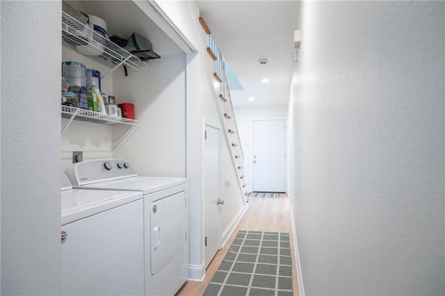 408 22 Nd St Unit 408, New Orleans, LA 70124 - laundry area featuring washing machine and dryer, light wood-style flooring, and recessed lighting