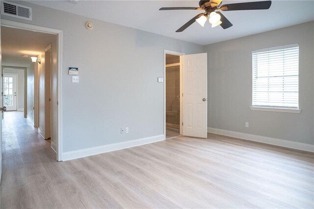 408 22 Nd St Unit 408, New Orleans, LA 70124 - unfurnished bedroom featuring light wood-style flooring, baseboards, and ceiling fan