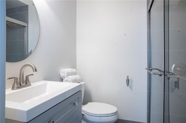 408 22 Nd St Unit 408, New Orleans, LA 70124 - bathroom with vanity, toilet, and an enclosed shower
