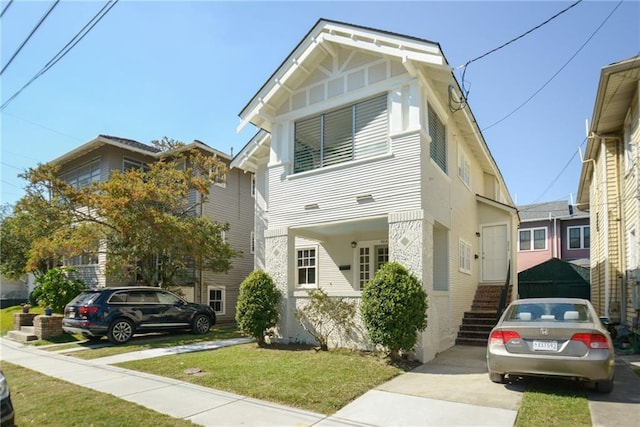 221012 Pine St, New Orleans, LA 70118 - view of front of home with a front lawn