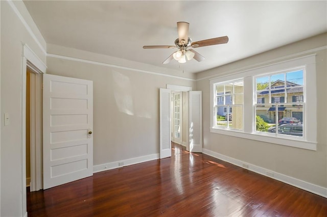 221012 Pine St, New Orleans, LA 70118 - empty room with wood finished floors and ceiling fan