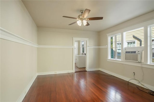 221012 Pine St, New Orleans, LA 70118 - spare room featuring wood finished floors, ceiling fan, cooling unit, and washer / dryer