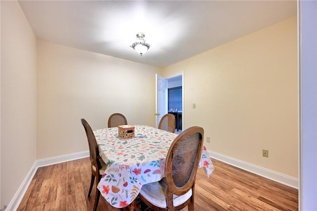 7701 Allison Rd, New Orleans, LA 70126 - dining area featuring light wood finished floors and baseboards