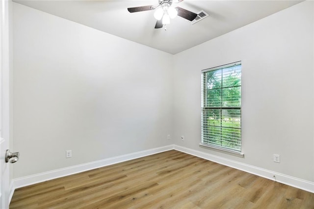 130 Palm Beach Blvd, Madisonville, LA 70447 - spare room with baseboards, light wood finished floors, and ceiling fan