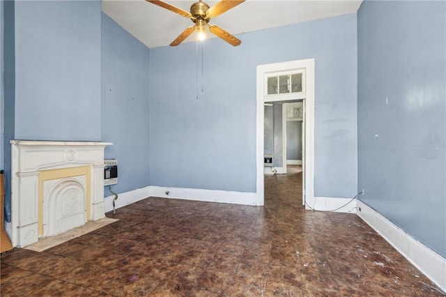 1432-1434 Ursulines Ave, New Orleans, LA 70116 - unfurnished living room with a ceiling fan, a fireplace with flush hearth, and baseboards