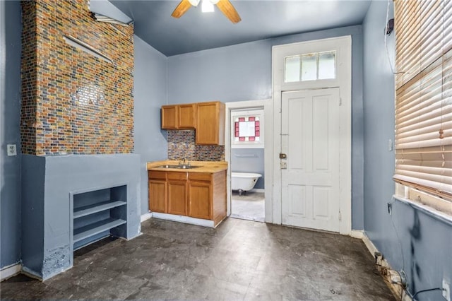 1432-1434 Ursulines Ave, New Orleans, LA 70116 - entrance foyer featuring ceiling fan and a fireplace