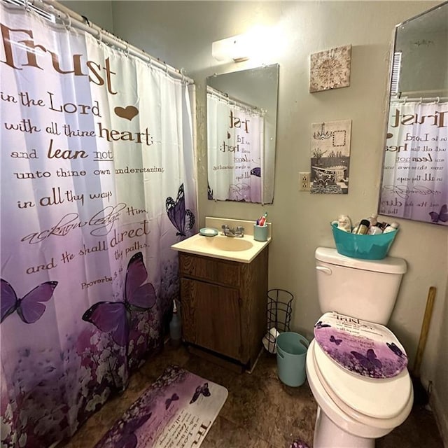 1432-1434 Ursulines Ave, New Orleans, LA 70116 - bathroom with toilet, vanity, and a shower with shower curtain