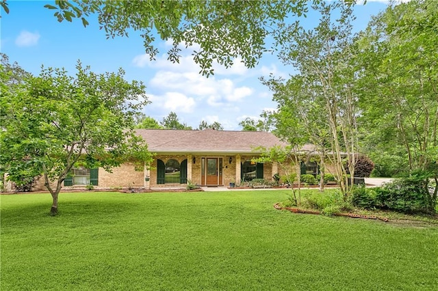 505 Hermitage Ct, Pearl River, LA 70452 - ranch-style home featuring a front lawn, a porch, and brick siding