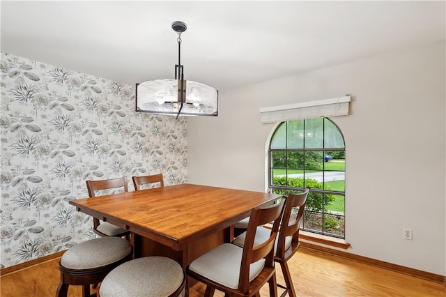 505 Hermitage Ct, Pearl River, LA 70452 - dining space with light wood finished floors, baseboards, and wallpapered walls