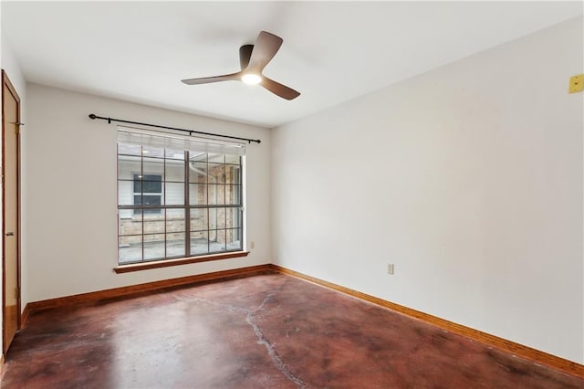 505 Hermitage Ct, Pearl River, LA 70452 - unfurnished room featuring concrete flooring, baseboards, and a ceiling fan