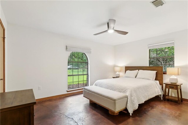 505 Hermitage Ct, Pearl River, LA 70452 - bedroom featuring finished concrete flooring, baseboards, and ceiling fan