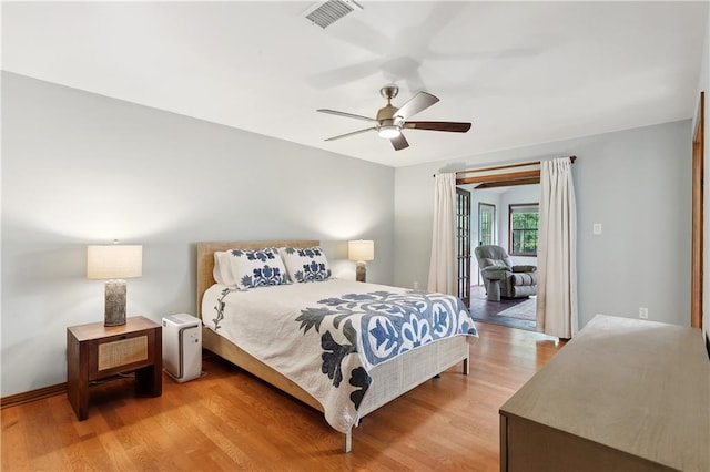 505 Hermitage Ct, Pearl River, LA 70452 - bedroom featuring access to outside, light wood-style floors, a ceiling fan, and baseboards