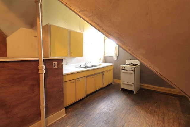410 S Cherry St, Hammond, LA 70401 - kitchen with white gas stove, dark wood-style flooring, a sink, lofted ceiling, and light countertops